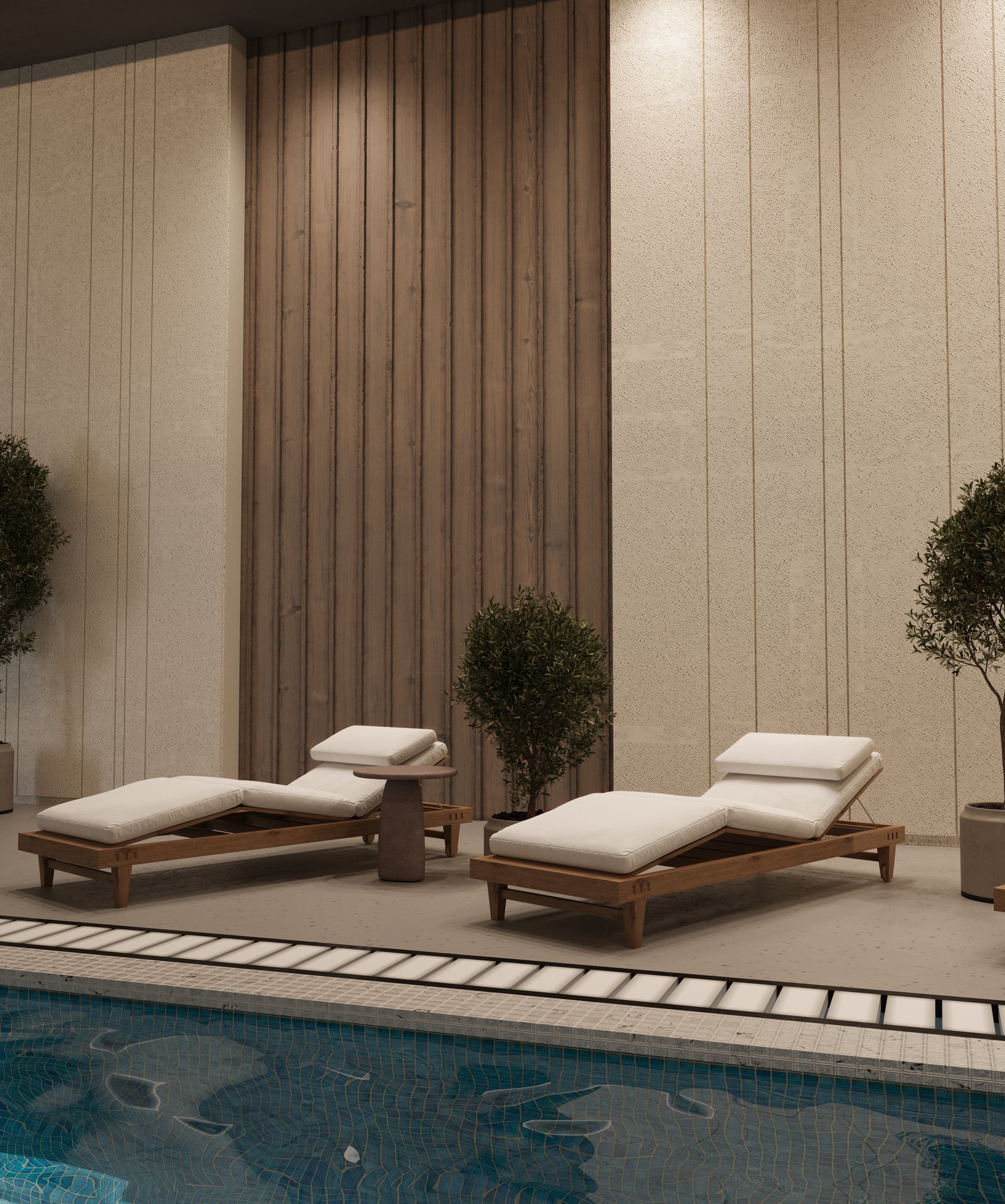 зона у бассейна с шезлонгами и спокойной атмосферой